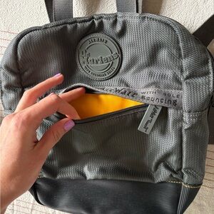 Dr. Martens Gray and Yellow Backpack Practical Design